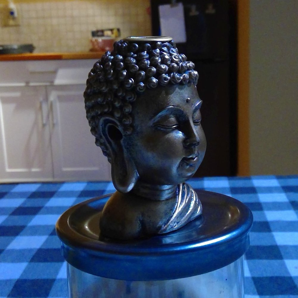 Buddha head incense holder